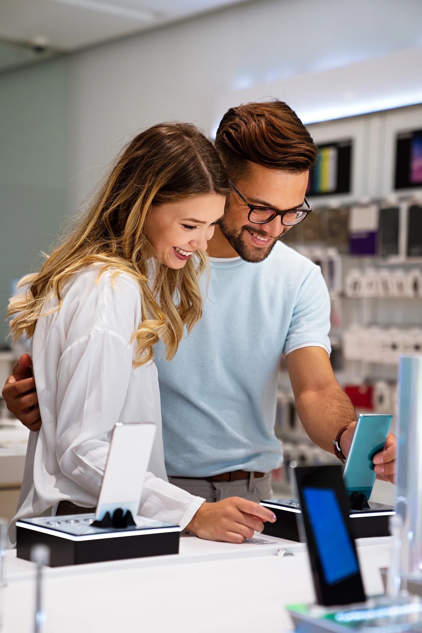 Shop assistant helping a customer at the counter